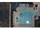 Aerial view of the community pool with lounge chairs, umbrellas, and play areas at 532 Front Ridge Dr, Cary, NC 27519