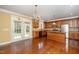 Open kitchen with wooden cabinets, stainless steel appliances, and a center island at 532 Front Ridge Dr, Cary, NC 27519