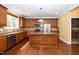 Well-equipped kitchen with stainless steel appliances, center island, and ample cabinet space at 532 Front Ridge Dr, Cary, NC 27519
