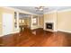 Spacious living room featuring hardwood floors, a fireplace, and bright, open layout at 532 Front Ridge Dr, Cary, NC 27519