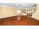 Spacious living room featuring hardwood floors, columns, and ample natural light at 532 Front Ridge Dr, Cary, NC 27519