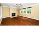 Living room features a cozy fireplace, hardwood floors, and plenty of natural light at 532 Front Ridge Dr, Cary, NC 27519
