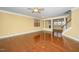 Spacious living room featuring hardwood floors, a fireplace, and a staircase at 532 Front Ridge Dr, Cary, NC 27519