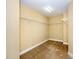 Spacious walk-in closet with carpet flooring and adjustable shelving for optimal storage at 532 Front Ridge Dr, Cary, NC 27519