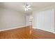 Bedroom with hardwood floors, neutral paint, closet, and natural light at 9132 Sanctuary Ct Ct, Raleigh, NC 27617