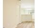 Basement bar area featuring new flooring, and shelving with a serving counter at 10 Marchmont Ct, Durham, NC 27705