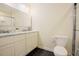 Modern bathroom features a double marble vanity and a frameless glass shower at 10 Marchmont Ct, Durham, NC 27705