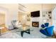 Open living area with fireplace, built-in shelves, and vaulted ceilings offers a spacious and inviting atmosphere at 10 Marchmont Ct, Durham, NC 27705