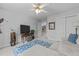 Inviting bedroom with bright natural light, ceiling fan, and closet at 112 White Lake Ct, Cary, NC 27519