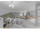 Open foyer featuring staircase with wooden railing and view of office and living spaces at 112 White Lake Ct, Cary, NC 27519