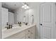 Bathroom featuring a double vanity with black fixtures and neutral paint color at 1328 Wakefield Farm Rd, Zebulon, NC 27597