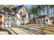 Charming home featuring a neutral color scheme, a driveway, and an outdoor basketball court at 1328 Wakefield Farm Rd, Zebulon, NC 27597