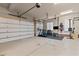 Spacious garage with room for home gym equipment and storage at 1328 Wakefield Farm Rd, Zebulon, NC 27597