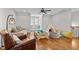 Bright playroom featuring hardwood floors, cozy seating, and fun play areas at 1328 Wakefield Farm Rd, Zebulon, NC 27597
