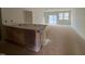 An unfinished kitchen with a wrapped island, ready to customize with your dream designs at 154 Parker Ln, Mebane, NC 27302