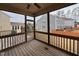 Enjoy serene backyard views from this charming screened-in porch with wood floors at 1546 Tinos Overlook Way, Apex, NC 27502