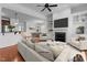 Inviting living room with fireplace, built-in shelves, hardwood floors and open floor plan at 200 Valleyshire Rd, Durham, NC 27707