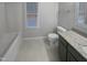 Bathroom with a shower-tub combination, tiled floors, and vanity with stone countertop at 206 Collegiate Cir, Durham, NC 27713