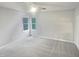 A bright and airy bedroom showcasing neutral tones and a serene atmosphere, perfect for relaxation at 206 Collegiate Cir, Durham, NC 27713