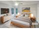 This bedroom features a spacious layout, large windows, and stylish decor, creating a comfortable retreat at 206 Collegiate Cir, Durham, NC 27713