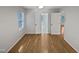 A bright bedroom with neutral walls and natural light coming in from the window at 206 Collegiate Cir, Durham, NC 27713