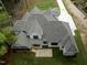 Aerial view showing the home's back porch and yard at 2410 Carpenter Pond Rd, Raleigh, NC 27613