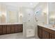 Luxurious bathroom features a tiled shower, dual sinks, and stylish fixtures at 2410 Carpenter Pond Rd, Raleigh, NC 27613