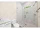 Bathroom with white tile shower and vanity at 2410 Carpenter Pond Rd, Raleigh, NC 27613