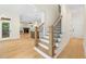 Entryway foyer leads to the second-story staircase and open-concept living spaces at 2410 Carpenter Pond Rd, Raleigh, NC 27613