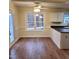 Dining area with wood flooring, white trim, and view of the backyard at 266 Sagamore Dr, Louisburg, NC 27549
