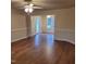 Spacious living area with wood flooring, neutral paint, and a ceiling fan at 266 Sagamore Dr, Louisburg, NC 27549
