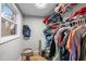 Walk in closet with shelves and hangers at 2908 Woods Pl, Raleigh, NC 27607
