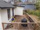 This deck offers a great view of the backyard and surrounding nature, perfect for relaxing or entertaining guests at 2908 Woods Pl, Raleigh, NC 27607