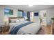Serene main bedroom with a plush bed, stylish decor, and lots of natural light at 2908 Woods Pl, Raleigh, NC 27607
