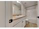 The bathroom features a single sink vanity, toilet, and shower-tub combo with modern fixtures at 300 Nelson Ln, Clayton, NC 27527