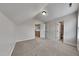 Bright bedroom features neutral walls and carpet with an ensuite bathroom, creating a private retreat at 300 Nelson Ln, Clayton, NC 27527