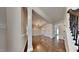 Dining room features decorative crown molding, hardwood floors, and an elegant light fixture at 300 Nelson Ln, Clayton, NC 27527