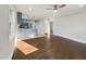 Open floor plan showcasing the seamless flow between the kitchen and the living area at 301 W Hill S Ave, Hillsborough, NC 27278