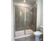 Bathroom features large, glass-enclosed tile shower with shower bench and tile flooring at 3019 Vitner Dr, Durham, NC 27704