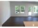 Spacious living room with dark wood floors and plentiful natural light at 3019 Vitner Dr, Durham, NC 27704