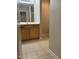 Bathroom with wood cabinets, tiled floor and views of the shower at 3108 Fortress Gate Dr, Raleigh, NC 27614