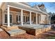 Expansive backyard featuring a pool with a cover, a covered patio, perfect for outdoor living and entertaining at 3605 Camp Mangum Wynd, Raleigh, NC 27612