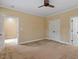 Bedroom with neutral carpet and ceiling fan at 3605 Camp Mangum Wynd, Raleigh, NC 27612