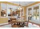The dining area offers views of the living room and outdoor patio at 3605 Camp Mangum Wynd, Raleigh, NC 27612