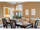 Bright dining area with a window view and traditional furnishings at 3605 Camp Mangum Wynd, Raleigh, NC 27612