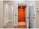 Home elevator with an open door, framed by white molding and hardwood flooring at 3605 Camp Mangum Wynd, Raleigh, NC 27612