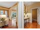 A bright and airy entryway, offering a glimpse into the living room and back patio at 3605 Camp Mangum Wynd, Raleigh, NC 27612