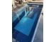 Inviting in-ground swimming pool with an automatic cover, perfect for relaxation and recreation in a private backyard setting at 3605 Camp Mangum Wynd, Raleigh, NC 27612