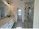 Modern bathroom featuring a double vanity, a marble-tiled shower, and modern fixtures at 4301 Darius Lane # 28, Fuquay Varina, NC 27526