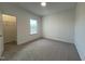 Bedroom featuring a walk-in closet and a window with an exterior view at 4301 Darius Lane # 28, Fuquay Varina, NC 27526